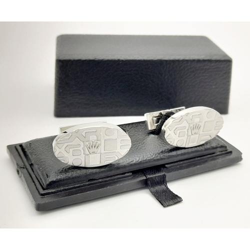 72 - A modern, stainless-steel pair of ROLEX cufflinks in new/unused condition, in a presentation box (no... 