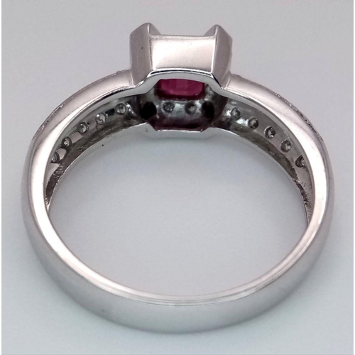 80 - AN 18K WHITE GOLD, DIAMOND AND RUBY CLUSTER RING. 4.5G. SIZE N. JR10