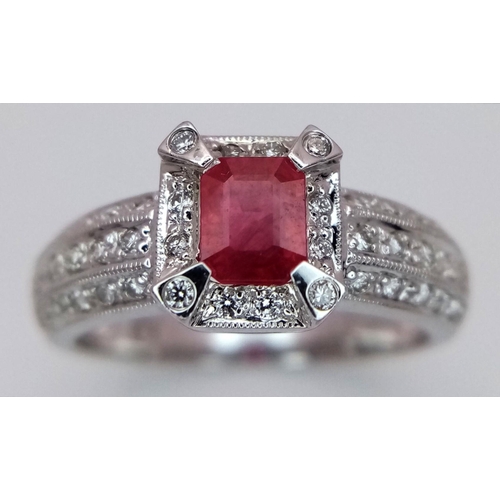 80 - AN 18K WHITE GOLD, DIAMOND AND RUBY CLUSTER RING. 4.5G. SIZE N. JR10