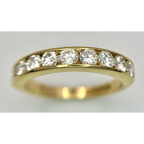 87 - AN 18K YELLOW GOLD DIAMOND HALF ETERNITY RING. 1CTW. 4G. SIZE N. A/S 1176