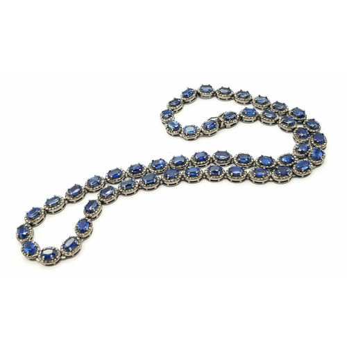 1228 - A 25ctw Kyanite Gemstone Tennis Necklace with Diamond Accents. 4ctw of old cut diamonds. Set in 925 ... 