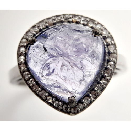 1242 - A Sterling Silver Tanzanite Heart shaped Ring, with Rose cut Diamonds. Tanzanite-4.35 Cts, Diamond- ... 