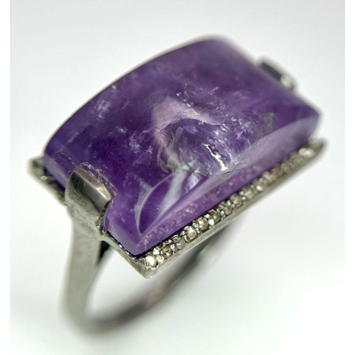 1621 - A Sterling Silver Amethyst Ring with Rose cut diamonds. Rectangular step cut. 14cts. Total weight: 7... 