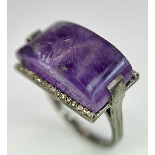 1621 - A Sterling Silver Amethyst Ring with Rose cut diamonds. Rectangular step cut. 14cts. Total weight: 7... 