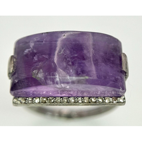 1621 - A Sterling Silver Amethyst Ring with Rose cut diamonds. Rectangular step cut. 14cts. Total weight: 7... 