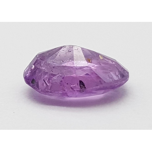 1544 - A 1.67ct Untreated Natural Madagascar Sapphire, Purplish Pink Colour, in the Oval Faceted cut. Comes... 