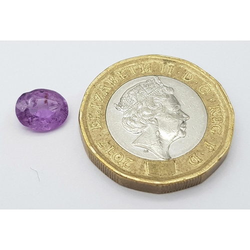 1544 - A 1.67ct Untreated Natural Madagascar Sapphire, Purplish Pink Colour, in the Oval Faceted cut. Comes... 