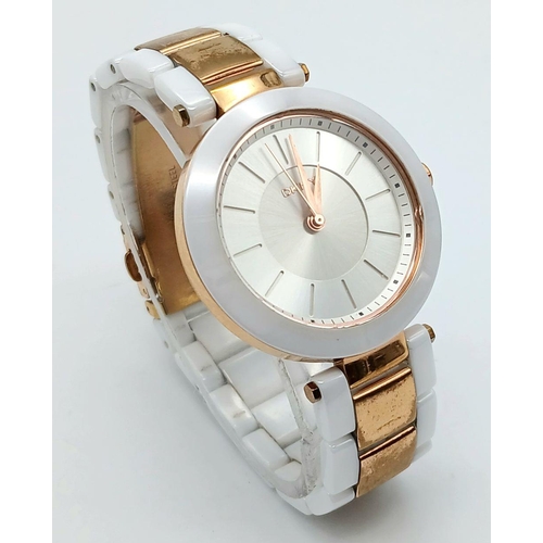 1147 - A Ladies Gold Tone and Ceramic Quartz Watch by DKNY. 36mm Case. New Battery Fitted October 2024.