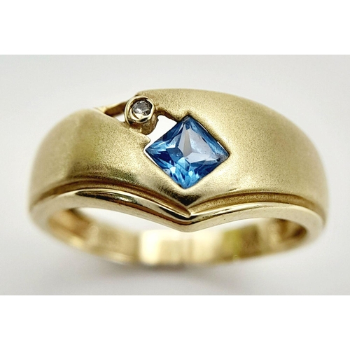 119 - A completely original 14 carat GOLD DESIGNER RING. Consisting SAPPHIRE and DIAMOND set to top in CHE... 