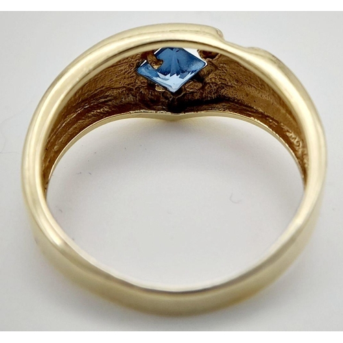 119 - A completely original 14 carat GOLD DESIGNER RING. Consisting SAPPHIRE and DIAMOND set to top in CHE... 