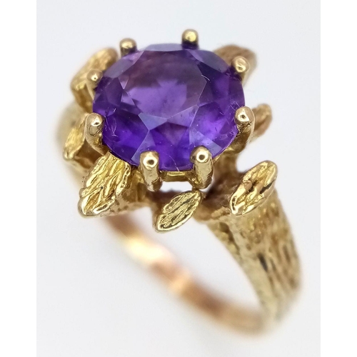 126 - A magnificent 9 CART GOLD and PURPLE TOURMALINE RING. Having a large (2 carat) round cut TOURMALINE ... 