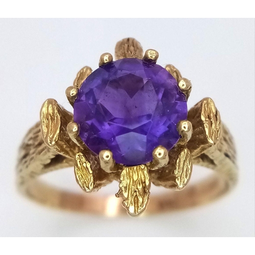 126 - A magnificent 9 CART GOLD and PURPLE TOURMALINE RING. Having a large (2 carat) round cut TOURMALINE ... 