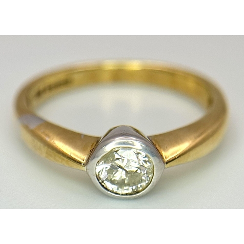 172 - AN 18K YELLOW GOLD DIAMOND SOLITAIRE RING. 0.35CT. 3.8G. SIZE L 1/2. JR14.