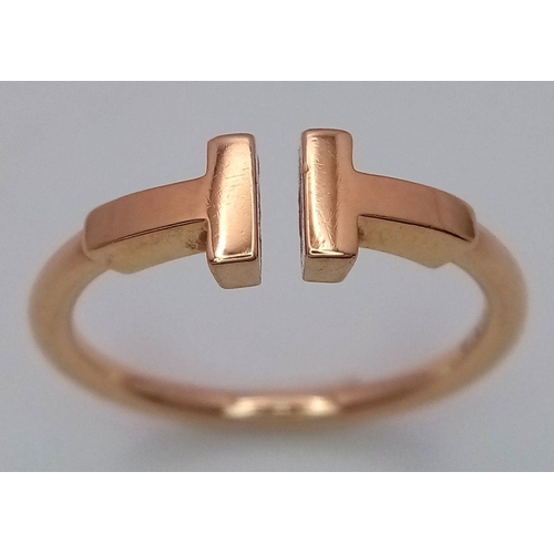 18 - A TIFFANY & CO T WIRE RING - 18K YELLOW GOLD. 3.4G. SIZE N. TAN 6021