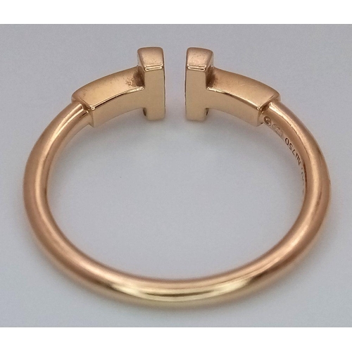 18 - A TIFFANY & CO T WIRE RING - 18K YELLOW GOLD. 3.4G. SIZE N. TAN 6021