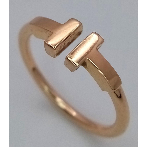 18 - A TIFFANY & CO T WIRE RING - 18K YELLOW GOLD. 3.4G. SIZE N. TAN 6021