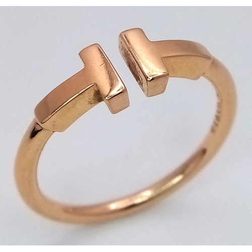 18 - A TIFFANY & CO T WIRE RING - 18K YELLOW GOLD. 3.4G. SIZE N. TAN 6021