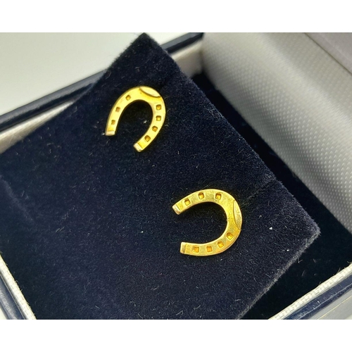 196 - A classic pair of 9 carat GOLD HORSESHOE STUD EARRINGS. complete with quality jewellers earring box.... 