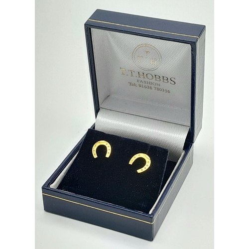 196 - A classic pair of 9 carat GOLD HORSESHOE STUD EARRINGS. complete with quality jewellers earring box.... 