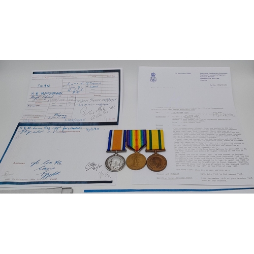 207 - A First World War group of three medals, including the Territorial Force War
Medal, consisting of: B... 