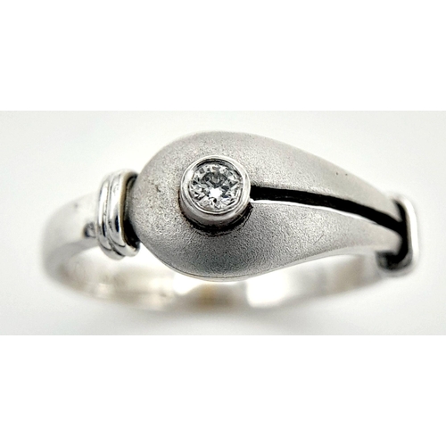 217 - Interesting and Attractive 14 CARAT WHITE GOLD and DIAMOND RING. Consisting smooth and frosted WHITE... 