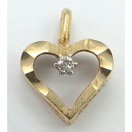 245 - A petite and delicate 9 carat GOLD HEART PENDANT with DIAMOND set to centre. 1.5 cm x 1.2 cm. 1.0 gr... 