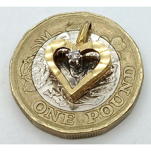 245 - A petite and delicate 9 carat GOLD HEART PENDANT with DIAMOND set to centre. 1.5 cm x 1.2 cm. 1.0 gr... 