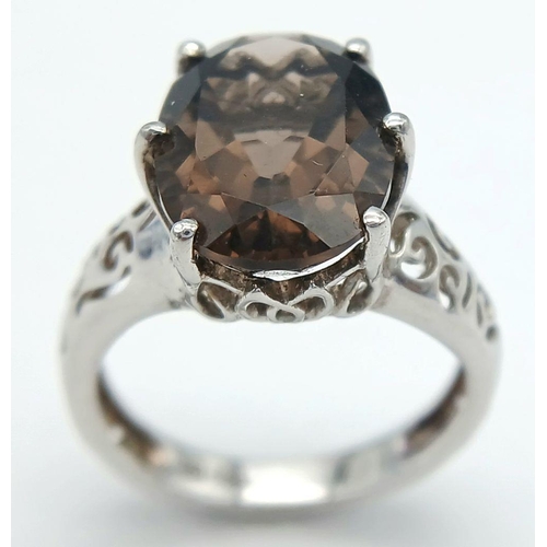 322 - Impressive SILVER and BROWN AMETHYST RING , Consisting a large  (3 CARAT)  BROWN AMETHYST SOLITAIRE ... 