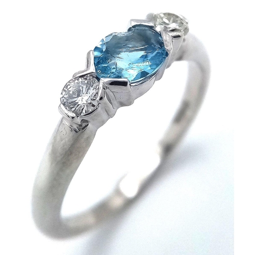 39 - AN 18K WHITE GOLD DIAMOND AND AQUAMARINE RING. 4.1G. SIZE O. AQUA HAS SLIGHT DAMAGE ON EDGE OF STONE... 