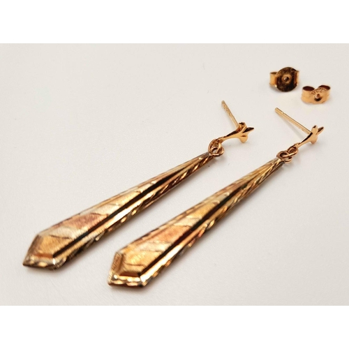 42 - A beautiful pair of Tricolour 9 CARAT GOLD EARRINGS. Baton Drop Style complete with Gold Backs. Pres... 