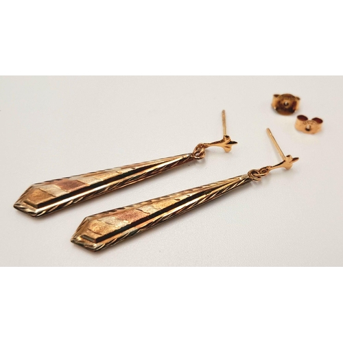 42 - A beautiful pair of Tricolour 9 CARAT GOLD EARRINGS. Baton Drop Style complete with Gold Backs. Pres... 