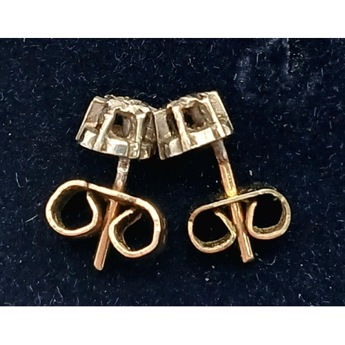 434 - Delicate pair of DIAMOND STUD EARRINGS. Set in 9 carat GOLD and complete with jewellers earring box.... 