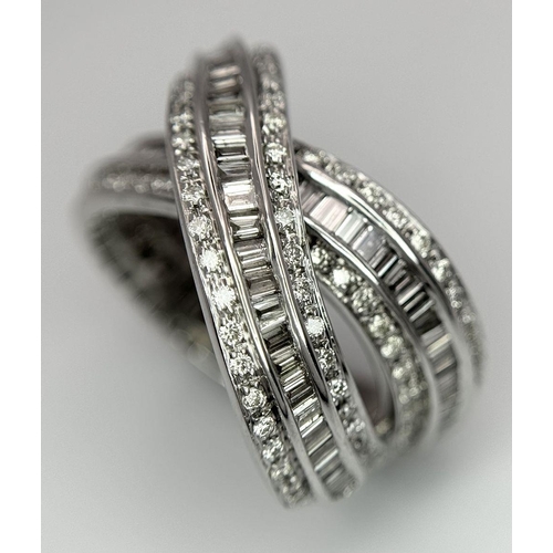 5 - A 14K WHITE GOLD DIAMOND THREE ROW CROSSOVER RING  - COMBO OF ROUND AND BAGUETTE CUT DIAMONDS - 2CTW... 