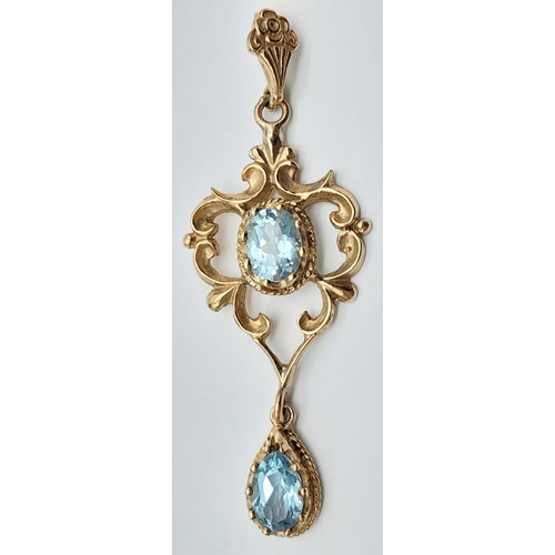 56 - A stunning Edwardian 9 carat GOLD PENDANT set WITH OVAL and PEAR CUT SWISS BLUE TOPAZ GEMSTONES. Pre... 