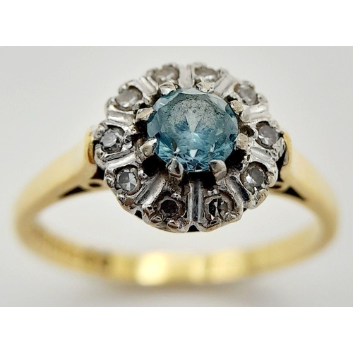 63 - An exceptionally pretty hallmarked 18 CARAT GOLD, AQUAMARINE and DIAMOND RING. Presented in ring box... 