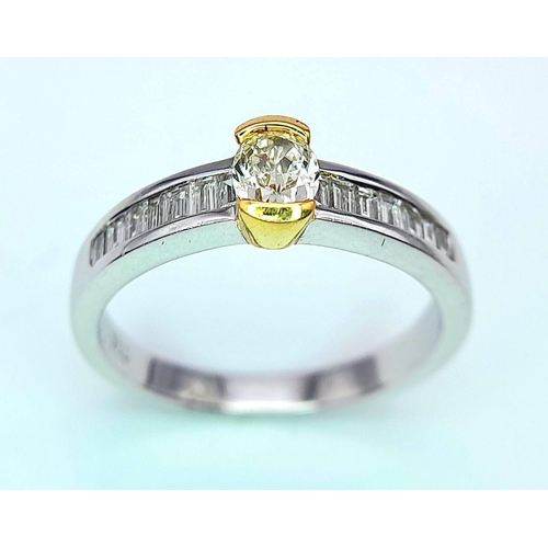 66 - AN 18K WHITE GOLD OVAL DIAMOND SOLITAIRE RING WITH DIAMOND SET SHOULDERS - 0.40CTW. 4G. SIZE N. JR8