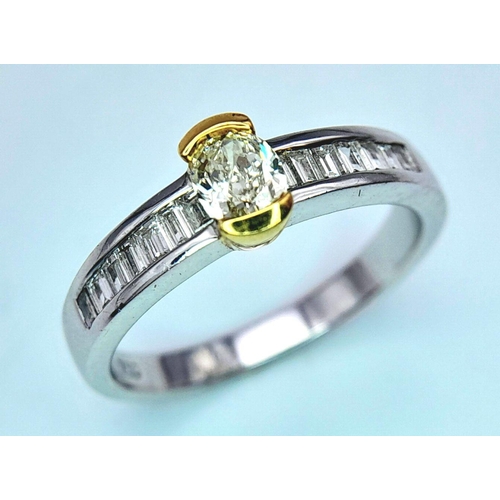 66 - AN 18K WHITE GOLD OVAL DIAMOND SOLITAIRE RING WITH DIAMOND SET SHOULDERS - 0.40CTW. 4G. SIZE N. JR8