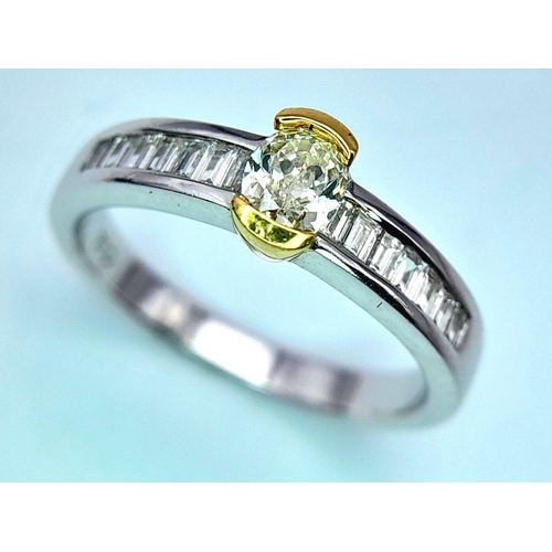 66 - AN 18K WHITE GOLD OVAL DIAMOND SOLITAIRE RING WITH DIAMOND SET SHOULDERS - 0.40CTW. 4G. SIZE N. JR8