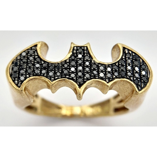 417 - A 9K YELLOW GOLD BLACK DIAMOND SET BATMAN RING! 4.6G. SIZE O. MANGE-TOUT RODNEY! TAN6001