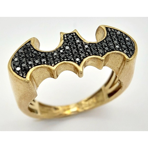 417 - A 9K YELLOW GOLD BLACK DIAMOND SET BATMAN RING! 4.6G. SIZE O. MANGE-TOUT RODNEY! TAN6001