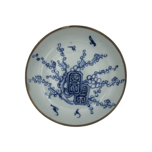 1362 - A set of antique Qing Dynasty Chinese blue and white porcelain tea plate and cup, featuring delicate... 