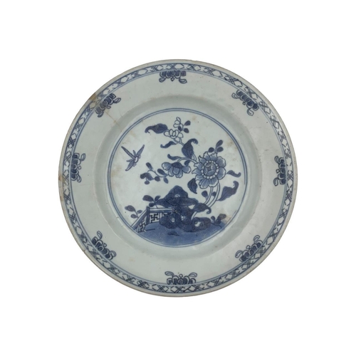 1377 - Two antique Kangxi Chinese blue and white porcelain plates. The first plate features floral and bird... 