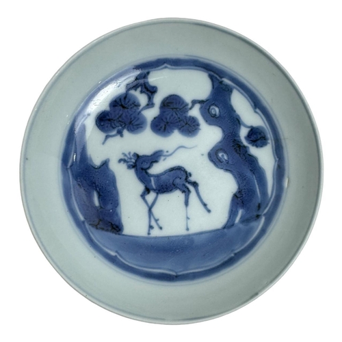 1377 - Two antique Kangxi Chinese blue and white porcelain plates. The first plate features floral and bird... 