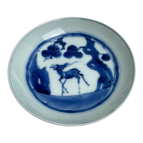 1377 - Two antique Kangxi Chinese blue and white porcelain plates. The first plate features floral and bird... 