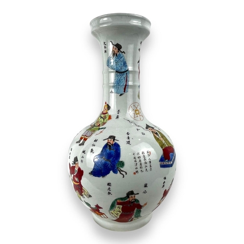 1398 - An antique Chinese Famille Rose Porcelain Vase. 
Hand-painted exterior with multicolored figures and... 