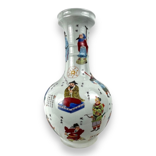 1398 - An antique Chinese Famille Rose Porcelain Vase. 
Hand-painted exterior with multicolored figures and... 