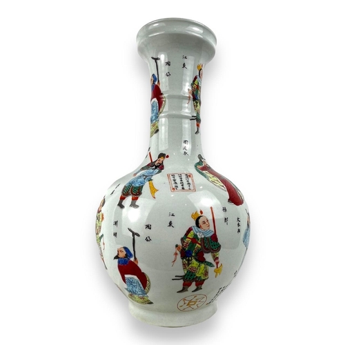 1398 - An antique Chinese Famille Rose Porcelain Vase. 
Hand-painted exterior with multicolored figures and... 