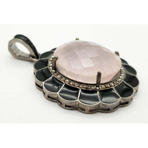 1565 - A 925 silver 22.45 Ct Rose Quartz Pendant with Rose cut 0.4 Ct diamonds. Total weight 10.1G. Ref HV ... 