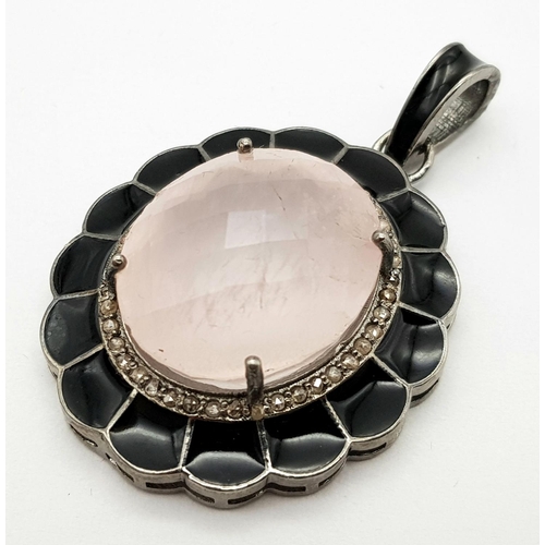 1565 - A 925 silver 22.45 Ct Rose Quartz Pendant with Rose cut 0.4 Ct diamonds. Total weight 10.1G. Ref HV ... 