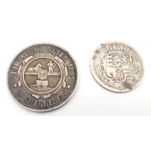 1392 - Two Silver Coins: 1817 George III Shilling and an 1894 South African 2 Shillings.